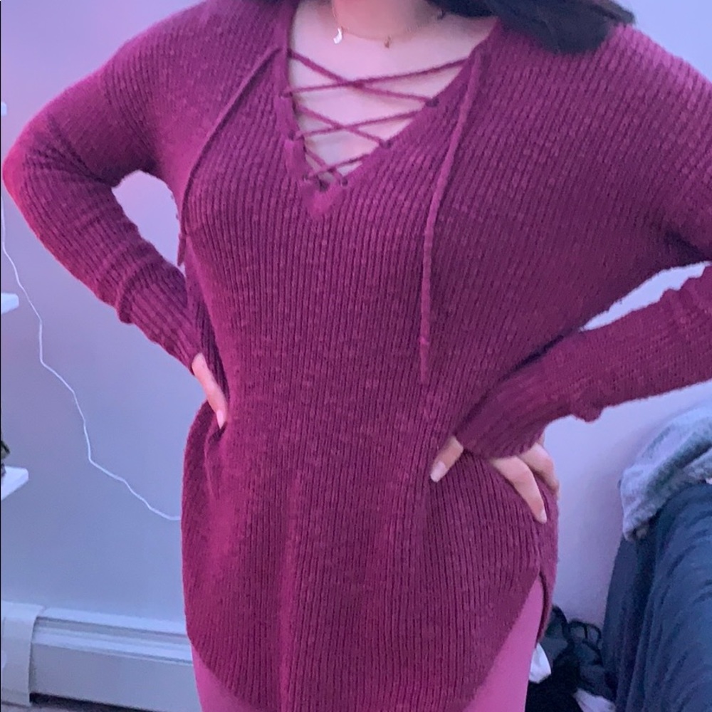 Cute red sweater with crossover design